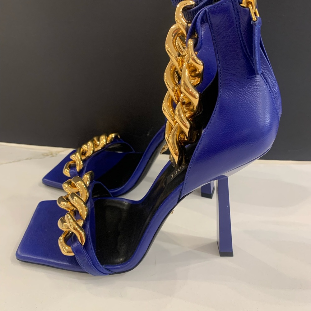 Versace Women’s Blue Heeled Sandals with Gold Chain Accent